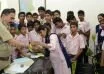 Children tie Suraksha Bandhan to police officials