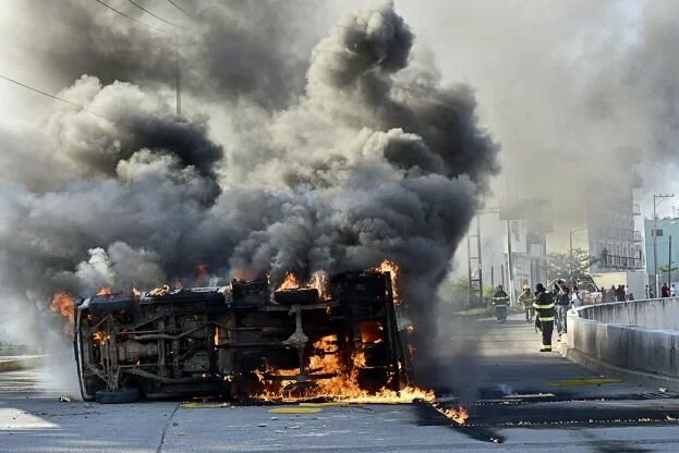 Mexican students torch cars after 43 feared massacred