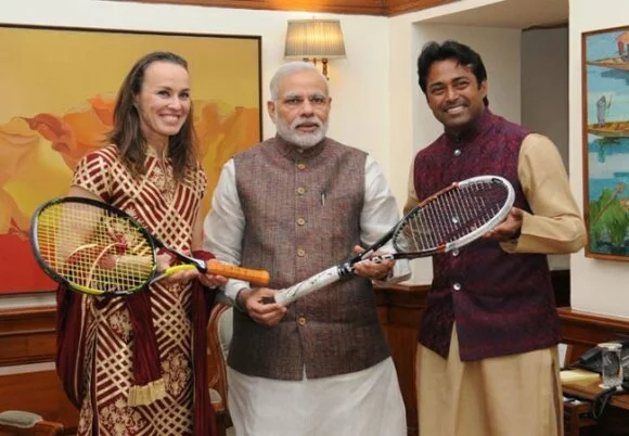 Martina Hingis, Leander Paes meet PM Modi: gift tennis rackets to him