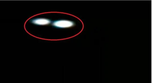 Two mysterious UFOs spotted hovering and merging over Leicestershire sky