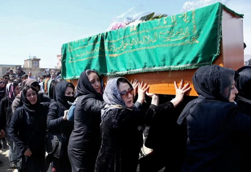 Afghanistan buries woman beaten to death by mob