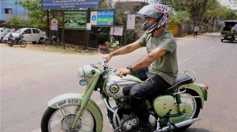 Faulty number plates on the bike: Dhoni fined